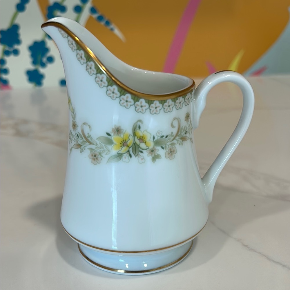 Mikasa fine china Greenbriar pattern creamer. Perfect condition.